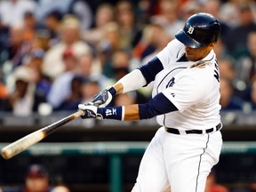 Detroit Tigers designated hitter Victor Martinez hits a two-run home run in the first inning against the Minnesota Twins at Comerica Park. (Rick Osentoski/USA TODAY Sports)