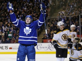 Maple Leafs forward Peter Holland celebrates after scoring against the Boston Bruins on Nov. 12, 2014. (CRAIG ROBERTSON/Toronto Sun)