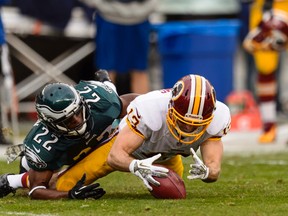 Washington Redskins wide receiver Nick Williams (13) recovers a muffed punt as Philadelphia Eagles cornerback Brandon Boykin (22) goes for the ball during NFL play at Lincoln Financial Field. (Howard Smith/USA TODAY Sports)