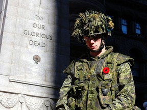 Sentries from the 48th Highlanders at the annual Remembrance Day ceremonies at the cenotaph in front of Toronto's Old City Hall on Tuesday November 11, 2014. Michael Peake/Toronto Sun/QMI Agency