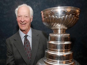 Gordie Howe mugs for a photo with the Stanley Cup during the Gordie Howe and Friends Luncheon in Calgary on Friday, April 13, 2012. (QMI Agency)