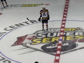 Kingston Frontenacs defenceman Jacob Graves skates near the Subway Super Series logo at centre ice at the Rogers K-Rock Centre on Friday. The series resumes Monday night in Kingston, where Team OHL will play Team Russia. (Doug Graham/The Whig-Standard)