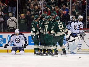 Minnesota Wild forward Zach Parise scores on the Jets in 2014. (BRACE HEMMELGAM/USA TODAY Sports)