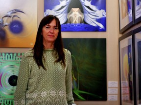 Artist Lianne Todd shows pieces of her work in her studio in Otterville. Todd had water-colour paintings and fractal art (pictured) on display.