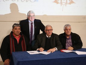 (L-R) Stan Delorme, David Dorward, Alfred Nikolai and Floyd Thompson signed a new MOU for housing on Kikino Métis Settlement.