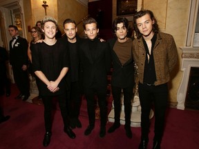 Members of boy band One Direction, Niall Horan (L-R), Liam Payne, Louis Tomlinson, Zayn Malik and Harry Styles, attend the Royal Variety Performance in support of the Entertainment Artistes' Benevolent Fund, at the Palladium Theatre in London November 13, 2014. REUTERS/Yui Mok/Pool