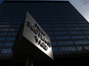 The sign outside New Scotland Yard reflects afternoon sunshine outside the headquarters of the Metropolitan Police in central London, March 6, 2014. (REUTERS/Andrew Winning)
