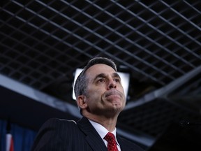 David Bertschi pauses during a news conference on Parliament Hill in Ottawa on March 21, 2013. (REUTERS/Chris Wattie)