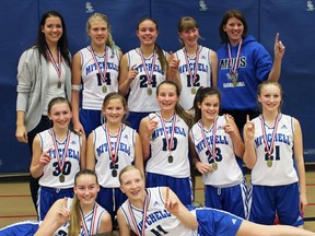 MDHS junior girls basketball team members are, back row (left to right): Assistant Coach Bailey Berlett, Elisa Bolinger, Erica Babb, Kelly Ward, Coach Diana MacLeod. Middle row (left): Kayla Bublitz, Savannah Hooper, Myah Vingerhoeds, Taylor Smith, Lauren Tracey. Front row (left): Megan Rohfritsch and Elaine White. SUBMITTED