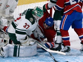Montreal Canadiens forward Max Pacioretty (67) crashes into the net of Minnesota Wild goalie Josh Harding (37) during the first period at the Bell Centre in this 2013 file photo. (Eric Bolte-USA TODAY Sports)