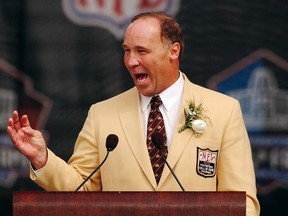 Joe DeLamielleure speaks after being inducted into the Pro Football Hall of Fame during a ceremony in Canton, Ohio, in this file photo from August 3, 2003. DeLamielleure is one of the most public faces among football's old-hands whose physical and financial health is diminished and who have a big beef with the powerful National Football League.  (REUTERS)