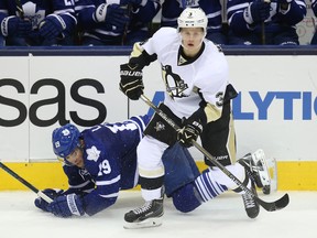 Pittsburgh Penguins defenceman Olli Maatta (3) looks on as Toronto Maple Leafs left wing Joffrey Lupul (19) falls at the Air Canada Centre earlier this season.