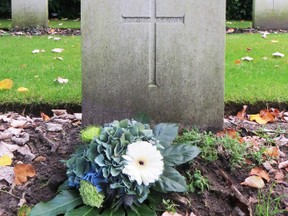 Flowers on grave of Russ Martin