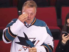 A screenshot from San Jose's win in Carolina Sunday night shows Grosenick’s father, Scott, tearing up in the upper deck.