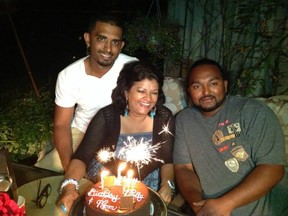 Tariq Mohammed (Right) with his mother, Molly, and his brother, Raoul. (SUPPLIED PHOTO)