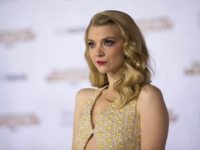 Cast member Natalie Dormer poses at the premiere of "The Hunger Games: Mockingjay - Part 1" in Los Angeles, California November 17, 2014. The movie opens on November 21. REUTERS/Mario Anzuoni