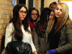 In the photo, Stephanie Beaudoin, the " sexy thief ", returns to the Victoriaville courthouse accompanied by her friends on Monday, Nov. 17, 2014 .ANDRÉANNE LEMIRE/QMI AGENCY