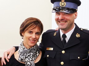 OPP Const. Pete Tucker is pictured with his wife Michelle. (Bill Sawchuk/QMI Agency)
