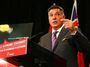 Ontario Finance Minister Charles Sousa releases the Fall Economic Statement at Queen's Park in Toronto on Monday November 17, 2014. (Dave Abel/Toronto Sun)