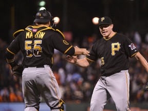 Russell Martin (left) celebrates with pitcher Mark Melancon. (USA TODAY SPORTS)