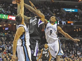Memphis Grizzlies centre Marc Gasol and guard Tony Allen defend against Sacramento Kings centre DeMarcus Cousins. (USA TODAY SPORTS)