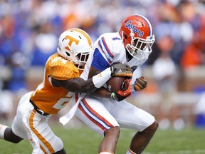 Quinton Dunbar of the Florida Gators makes a reception in front of Michael Williams of the Tennessee Volunteers during the first half of the game at Neyland Stadium on October 4, 2014. (Joe Robbins/Getty Images/AFP)