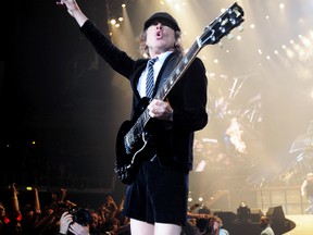 AC/DC guitarist Angus Young revealed his brother Malcolm kept writing playing music as long as he could. (WENN.com)