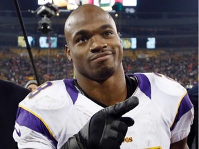 Minnesota Vikings running back Adrian Peterson leaves the field after a loss to the Green Bay Packers in their NFL NFC wildcard playoff football game in Green Bay in this file photo taken January 5, 2013. (REUTERS/Tom Lynn/Files)