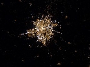 A night-time satellite image of Winnipeg.