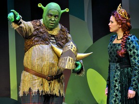 Steve Ross (as Shrek) and Elicia MacKenzie (as Princess Fiona) rehearse a scene from Shrek The Musical at The Grand Theatre in London Ont. Nov. 19, 2014. CHRIS MONTANINI\LONDONER\QMI AGENCY