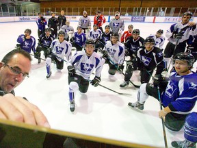 Western Mustangs hockey coach Clarke Singer draws up plays during a team practice. The Mustangs are enjoying a three-game win streak. (CRAIG GLOVER, The London Free Press)