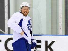 Phil Kessel makes sure his jersey is nice and secure at Maple Leafs practice on Wednesday. (Dave Abel/Toronto Sun)