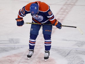 The Edmonton Oilers' Ryan Nugent-Hopkins (93) waits for the ruling on an Edmonton goal scored with 8.1 seconds left in their game against the Vancouver Canucks, at Rexall Place, in Edmonton Alta., on Wednesday Nov. 19, 2014. The goal was disallowed and the Canucks won 5-4. David Bloom/Edmonton Sun/QMI Agency