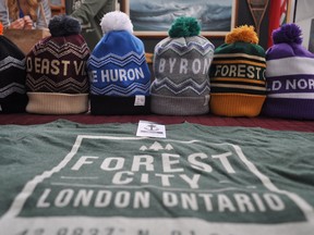 A line of neighbourhood-specific toques by local company dpms at their Western Fair Farmer’s Market location Nov. 19, 2014. CHRIS MONTANINI\LONDONER\QMI AGENCY