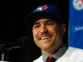New Blue Jays catcher Russell Martin was all smiles at his introductory news conference on Thursday. (Craig Robertson/Toronto Sun)