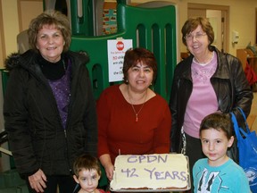 Coronation Park Day Nursery held an open house Thursday night, just over one week before the daycare centre will close. Behind from left are former staff member Valerie McNeill, Coronation Park supervisor Theresa Baldassarre and former staff member Linda Haslip. In front from left are Presley Trepanier, 2, and Liam Trepanier, 5. (TERRY BRIDGE/THE OBSERVER)