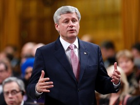 Canadian prime minister Stephen Harper speaks during Question Period in the House of Commons on Parliament Hill in Ottawa, Nov. 19, 2014. (CHRIS WATTIE/Reuters)