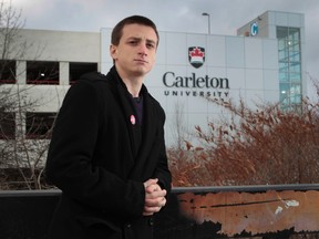 Carleton University student Adam Carroll poses for a photo at Carleton University in Ottawa Thursday Nov 20,  2014.  Adam is a CUSA councillor who wants some answers to some financial discrepancies in the student association books. 
Tony Caldwell/Ottawa Sun/QMI Agency