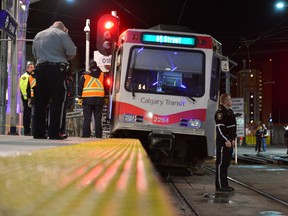 A westbound CTrain derailed just east of City Hall station, causing the train to strike and mount the station's platform. The collision comes just hours after a pedestrian was struck at the same station. Bryan Passifiume/Calgary Sun/QMI Agency