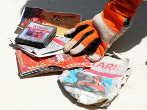 The first recovered Atari cartridge and packaging recovered from the old Alamogordo landfill are shown in Alamogordo, N.M., April 26, 2014. REUTERS/Mark Wilson