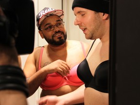 DJ’s John and Rasheed try on bras after their chests injected with a saline solution to emulate female breasts. (jam.fm photos)