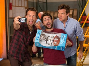 Jason Sudeikis, Charlie Day and Jason Bateman with the 'Shower Buddy' in a scene from Horrible Bosses 2. (John P. Johnson/ Warner Bros. Entertainment Inc.)