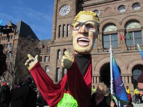 Ontario Health Coalition drew support from several major unions to their protest in front of Queen's Park on Friday, Nov. 21, 2014 over "cuts" to health care. (ANTONELLA ARTUSO/Toronto Sun)