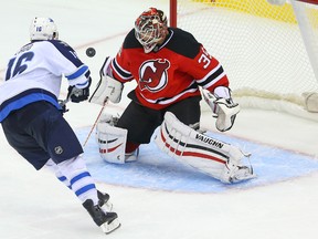 Devils goalie Cory Schneider played in his 20th consecutive game since the beginning of the season. (USA TODAY SPORTS)