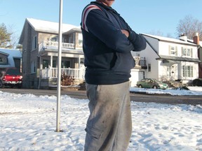 Gary Boyd poses for a photo on Fraser Street in Ottawa Friday Nov 21,  2014. Boyd is delighted with the NCC's decision to reject the city's proposal to extend LRT across federal land near his home on Fraser Ave. 
Tony Caldwell/Ottawa Sun/QMI Agency