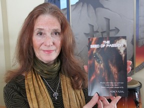 Monica Royal with her new book. TYLER KULA/ THE OBSERVER/ QMI AGENCY