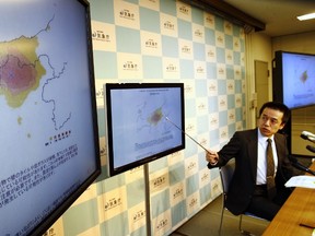 Japan Meteorological Agency officer Yohei Hsegawa speaks during a press conference in Tokyo on November 23, 2014. (AFP PHOTO/JIJI PRESS)