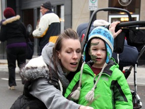 Andrea Williamson and two-year-old Lincoln, in this 2012 Observer file photo, stop to check out the ice sculptures along Lochiel Street during Winter Artwalk. This year's Winter Artwalk is being held at Memorable Moments Dec. 5. (Observer file photo)