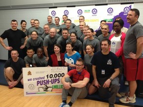 Members of the EPS joined in this year's push up challenge on Nov. 22, 2014,  to support iHuman. Kevin Maimann/Edmonton Sun