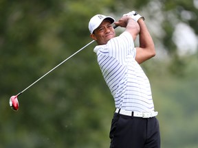 PGA golfer Tiger Woods tees off on the 5th hole during the second round of the 2014 PGA Championship golf tournament at Valhalla Golf Club on Aug 8, 2014 in Louisville, KY, USA. (Spurlock/USA TODAY Sports)